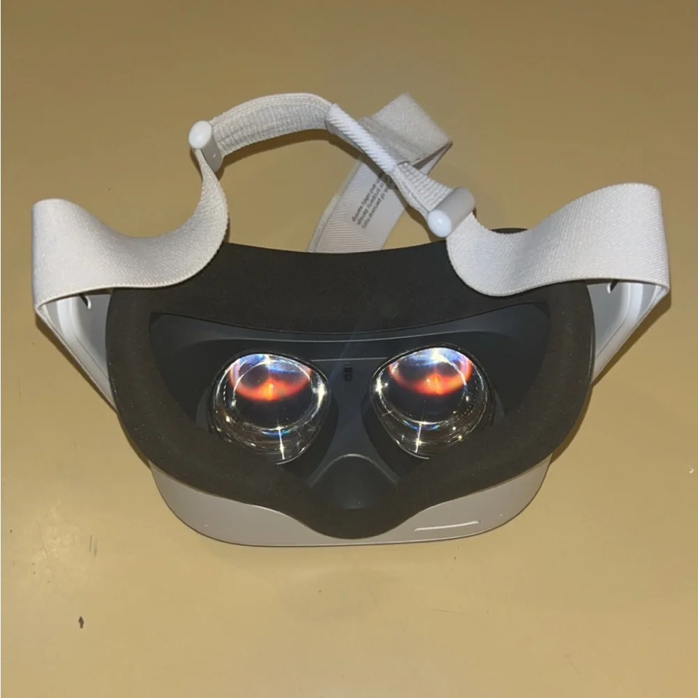 Oculus meta quest 2 Headset with White Strap and two controllers